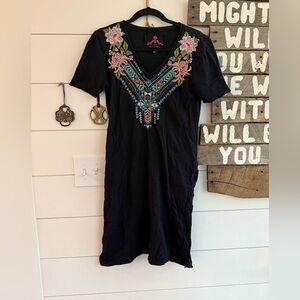 Johnny was size small tunic